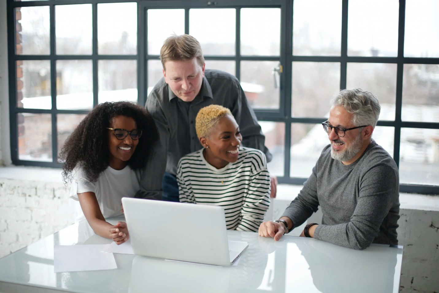 Happy employees working together